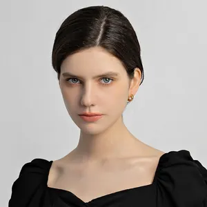 Elegant minimalist gold hoop earrings for women featuring a vintage aesthetic look