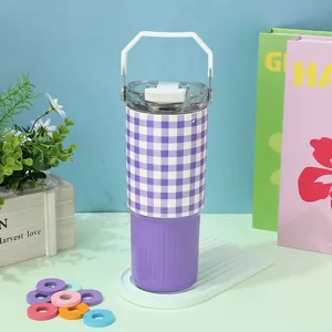 Close-up of 30oz purple checkered insulated tumbler with straw lid and handle.