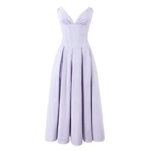 Detail of lavender pleated A-line dress with corset bodice and V-neckline design.