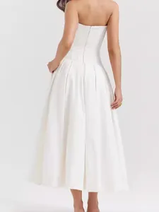 Elegant white strapless A-line midi dress with pleated waist and corset bodice detail