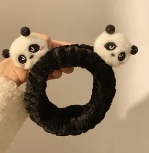 Cute panda plush hairband for washing face and makeup application, soft winter accessory