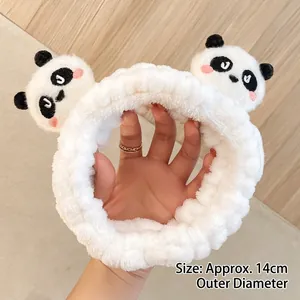 Cute soft white plush panda headband for face washing and makeup skincare routine