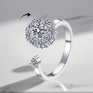 Detailed view of adjustable silver-plated spinner ring with sparkling zircon stones