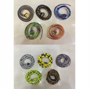 Realistic rubber toy snakes in various colors and patterns for pranks and decoration.