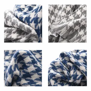 Detailed macro shots of blue houndstooth scarf showing soft brushed fabric and fringes