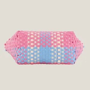 Elegant colorful hand-woven plastic picnic bag with pink and blue contrast pattern design