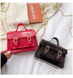 Stylish glossy red and black jelly Cambridge style crossbody bags with gold chain straps