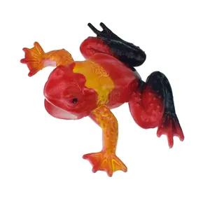 Detailed view of a red and orange rubber frog prank toy for novelty gag gifts.