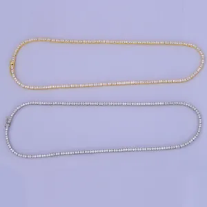 Detail of 2mm hip hop tennis necklaces in gold and silver finishes with CZ stones