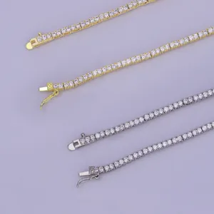 Detailed view of 2mm gold and silver tennis necklaces with sparkling CZ stones