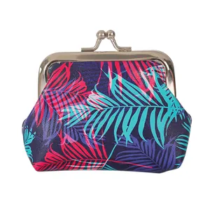 Vibrant tropical palm leaf print coin purse featuring a silver metal kiss-lock clasp closure
