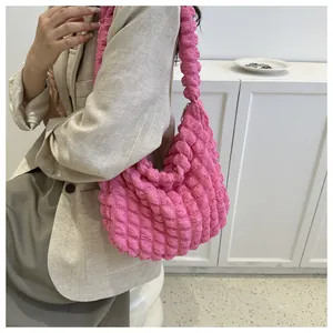 Stylish pink bubble textured cloud shoulder bag with large capacity for daily commuting