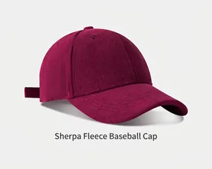 Close-up of a burgundy suede baseball cap with fine stitching and soft fleece texture.