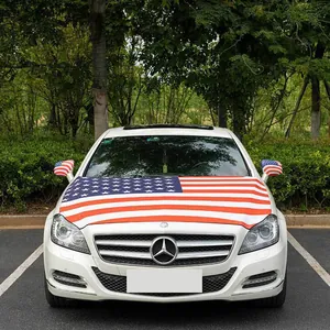 Detail of durable US flag car hood cover and side mirror sets on a white vehicle