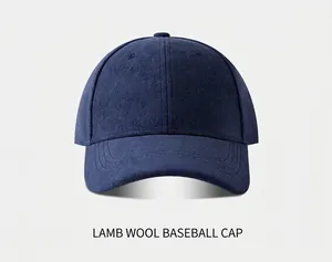 Close-up detail of navy blue suede baseball cap highlighting rich fabric texture