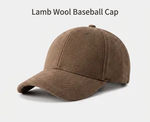 Macro view of a brown suede baseball cap highlighting its soft fuzzy surface texture