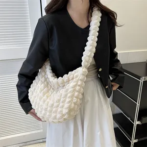 Chic cream bubble textured cloud shoulder bag with large capacity for daily commuting