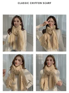 Detailed view of winter yellow houndstooth scarf worn by model in soft lighting
