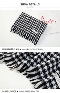 Detailed macro view of black and white houndstooth scarf with elegant fringe tassels