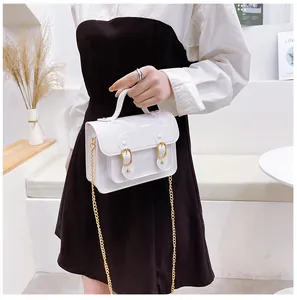 Stylish white semi-transparent jelly Cambridge bag with elegant gold chain strap detail