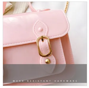 Detailed close-up showing the durable gold buckle on a stylish pink jelly Cambridge bag