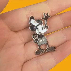 Detailed metal enamel pin featuring classic Mickey Mouse character for clothing decor
