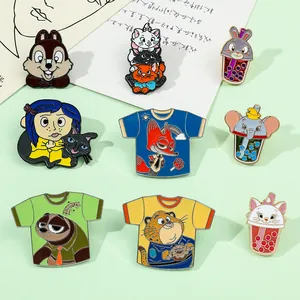 Variety of colorful enamel pins featuring cartoon characters in boba and T-shirt designs.
