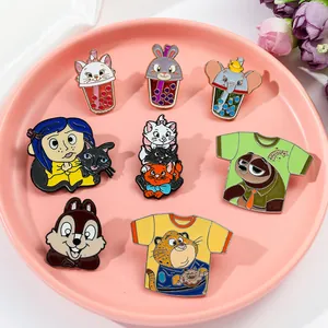 Variety of cartoon animal enamel pins featuring Zootopia and Disney characters on a plate.