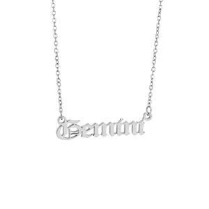 Detailed shot of a silver stainless steel Gemini zodiac nameplate pendant on O-chain