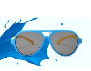 Close-up of blue kids aviator sunglasses with dynamic blue paint splash