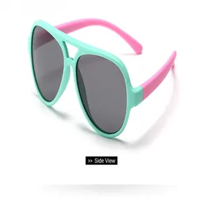 Children's polarized aviator sunglasses in teal and pink shown from a side view.