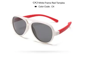 Detailed view of children's aviator sunglasses with white frame and red temples, C4