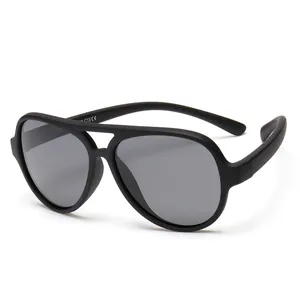 Stylish black matte aviator polarized sunglasses for children with UV400 protection lenses.