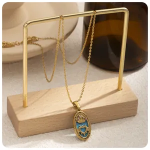 Vintage stainless steel necklace featuring The Empress tarot card pendant macro view