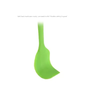 Heat-resistant one-piece green silicone spatula demonstrating 90-degree flexibility