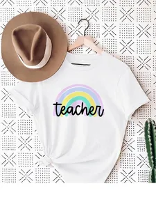 Detailed view of white cotton T-shirt featuring rainbow graphic and teacher text print