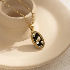 Vintage gold stainless steel tarot necklace featuring The World card pendant design