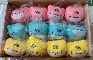 Bulk pack of colorful tiger head squishy toys for stress relief in individual bags