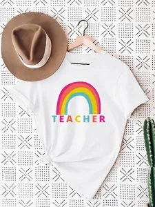 Women's casual white t-shirt featuring a colorful rainbow and TEACHER letter print