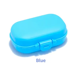 Portable bright blue plastic storage box with snap closure for pills or jewelry