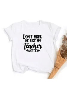 Detailed view of the humorous teacher voice graphic print on a white cotton t-shirt