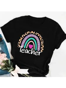 Detailed macro view of a black cotton T-shirt featuring a leopard rainbow Teacher graphic print