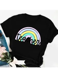 Womens black cotton T-shirt featuring a colorful rainbow and Teacher script design