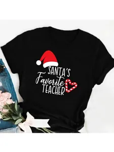 Close-up of the creative Santa's Favorite Teacher graphic on a black summer T-shirt