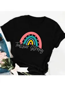 Detailed view of a black casual cotton T-shirt featuring a colorful Teacher Strong rainbow print