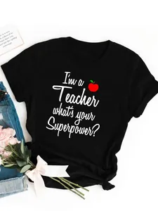 Close-up detail of a black cotton t-shirt with 'I'm a Teacher what's your Superpower?' print.