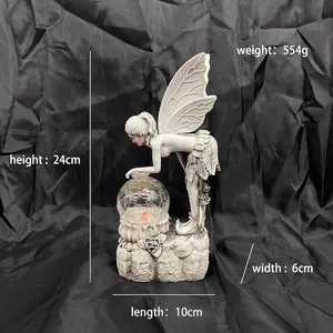 Detailed dimension view of solar-powered flower fairy resin ornament with crystal ball