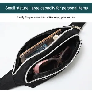 Interior view of black waist bag showing capacity for phone and sunglasses.