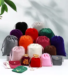 Close-up display of colorful velvet drawstring pouches and small jewelry storage bags