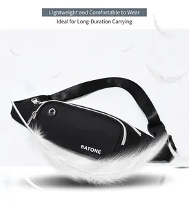 Detailed macro shot of a lightweight black waterproof sports waist bag with feathers